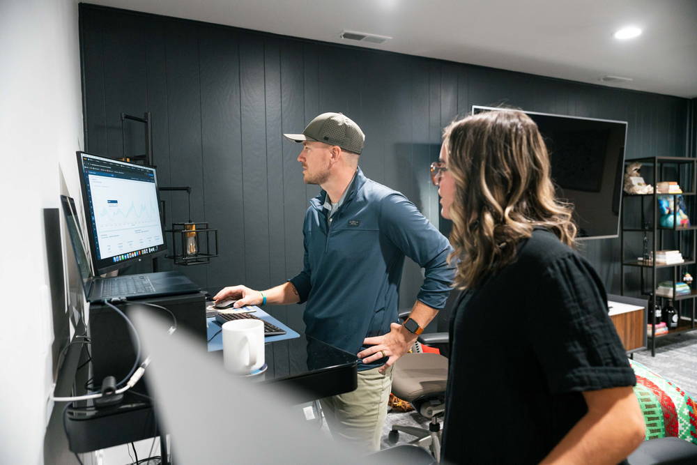 Two team members planning out client strategy.